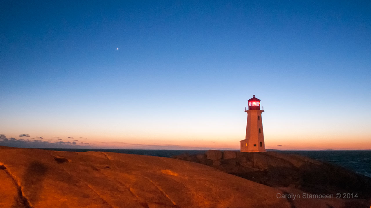 Peggy's Cove lighthouse at dusk