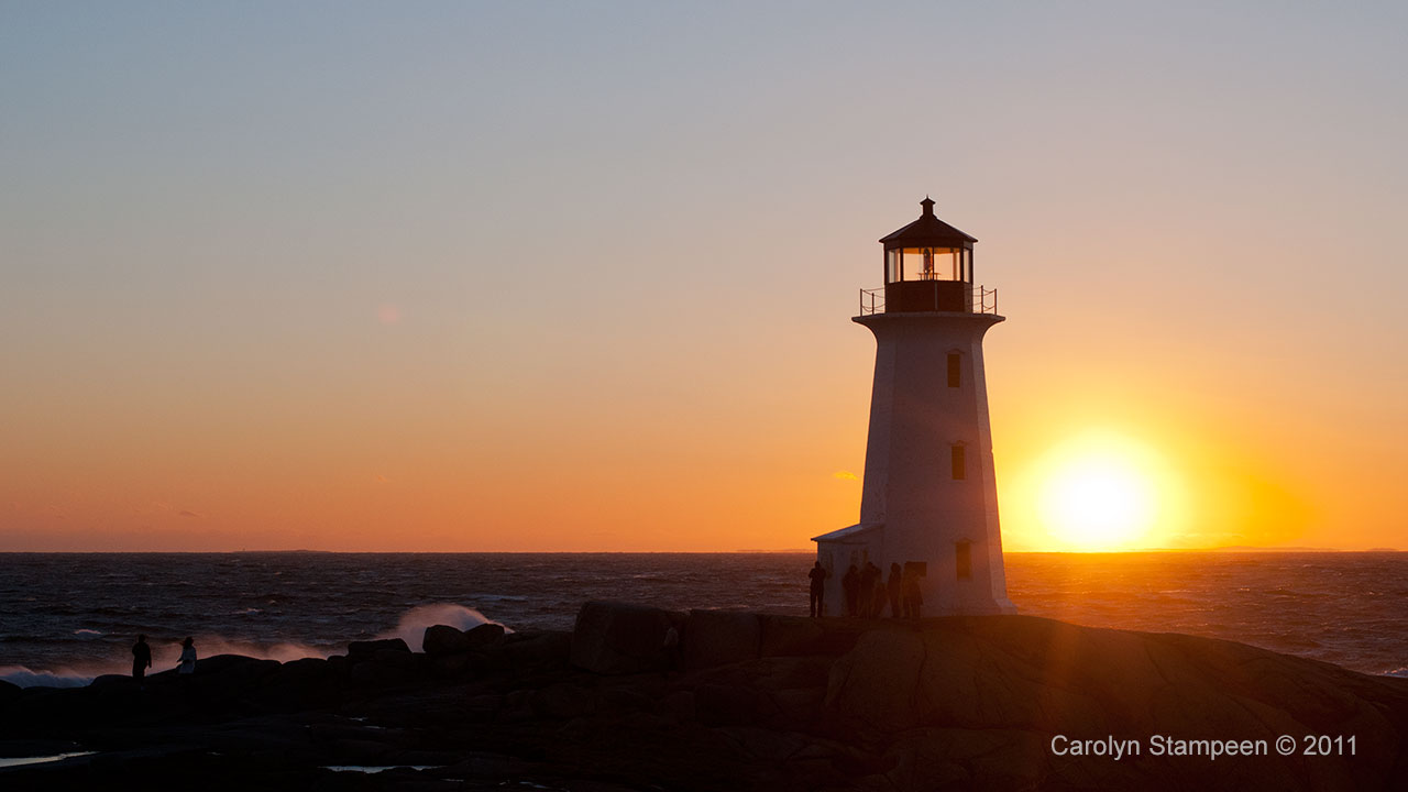 Peggy's Cove lighthouse at sunset